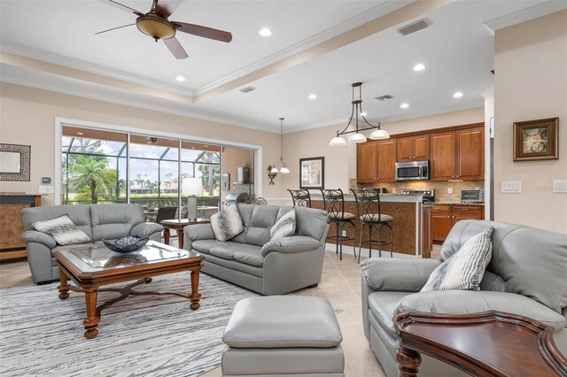 living room featuring light tile patterned floors, visible vents, a ceiling fan, crown molding, and recessed lighting