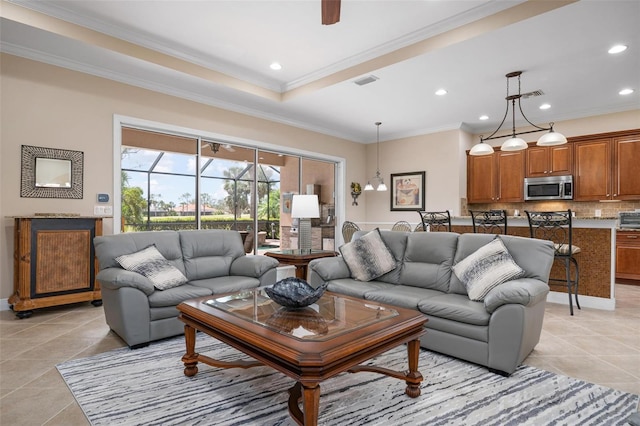 living room featuring ornamental molding, recessed lighting, visible vents, and light tile patterned floors