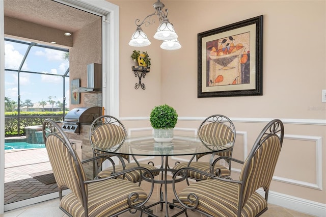 dining area with a sunroom