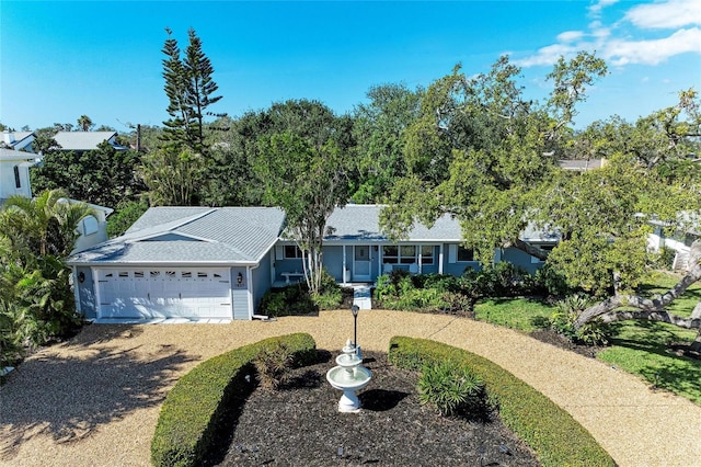 view of front of house with a garage and driveway