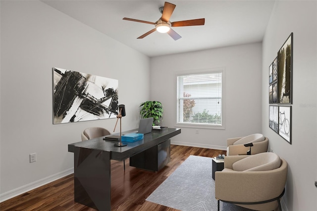 home office with dark wood-style floors, baseboards, and a ceiling fan