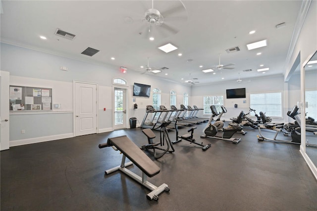 gym featuring visible vents, crown molding, baseboards, and ceiling fan