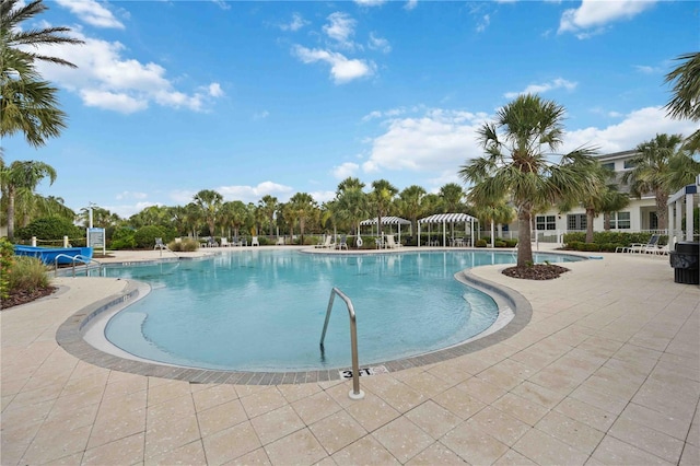 community pool with a patio