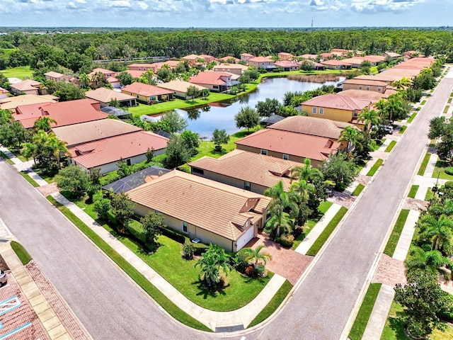 aerial view with a water view and a residential view