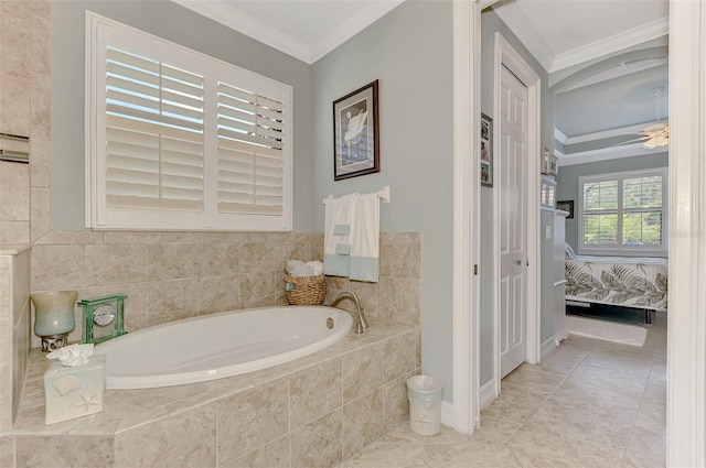 full bath featuring baseboards, connected bathroom, a ceiling fan, a garden tub, and crown molding