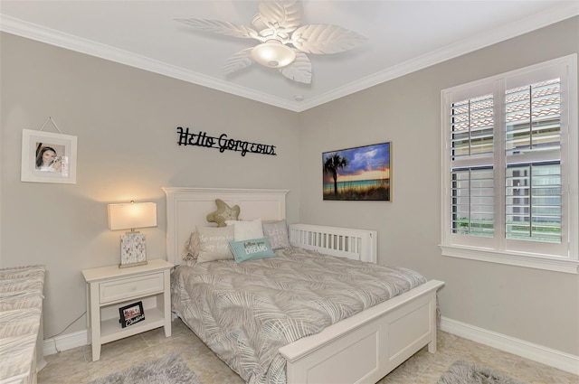 bedroom featuring multiple windows, baseboards, and ornamental molding