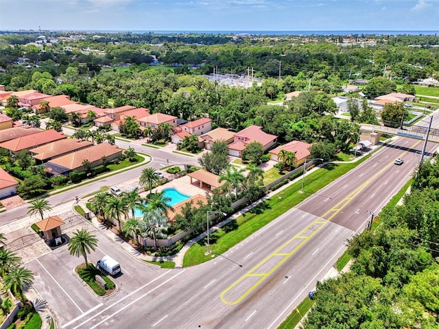 birds eye view of property with a residential view