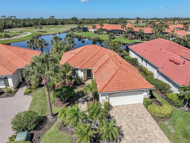 bird's eye view with a water view