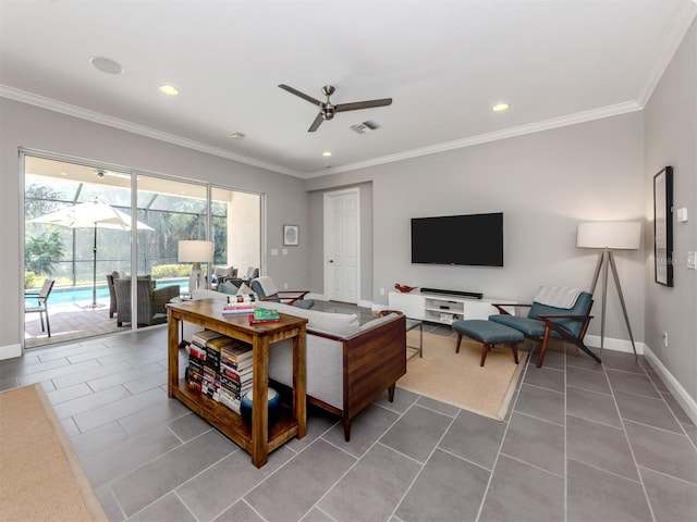 living area with tile patterned flooring, a sunroom, visible vents, baseboards, and ornamental molding