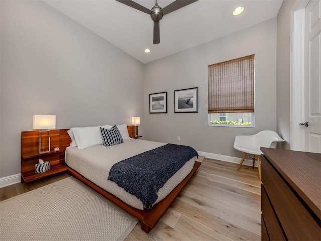 bedroom featuring a ceiling fan, light wood-type flooring, baseboards, and recessed lighting