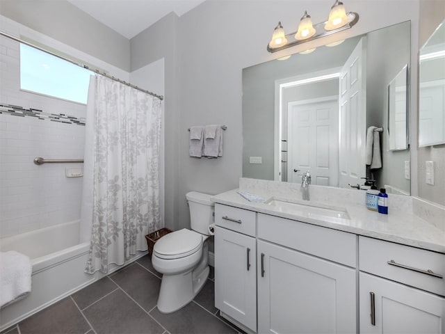 full bathroom featuring tile patterned flooring, shower / tub combo with curtain, vanity, and toilet