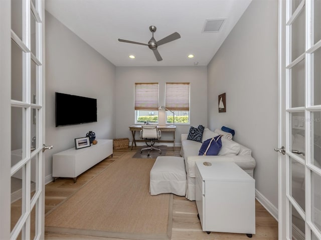 interior space with baseboards, french doors, visible vents, and recessed lighting