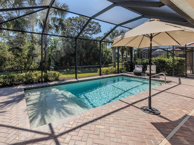 pool featuring a patio area and a lanai