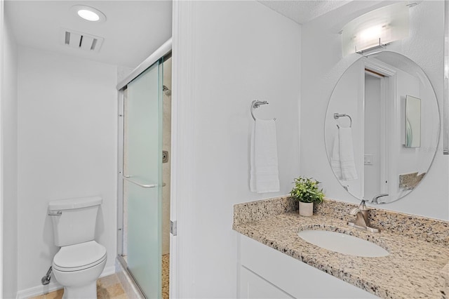 full bath with toilet, a stall shower, visible vents, and vanity