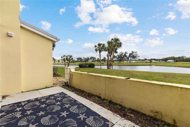 view of patio / terrace with a water view