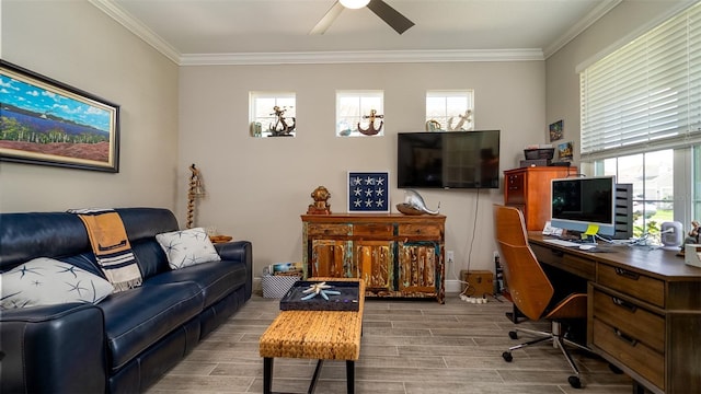 office space with ornamental molding, wood finish floors, plenty of natural light, and a ceiling fan