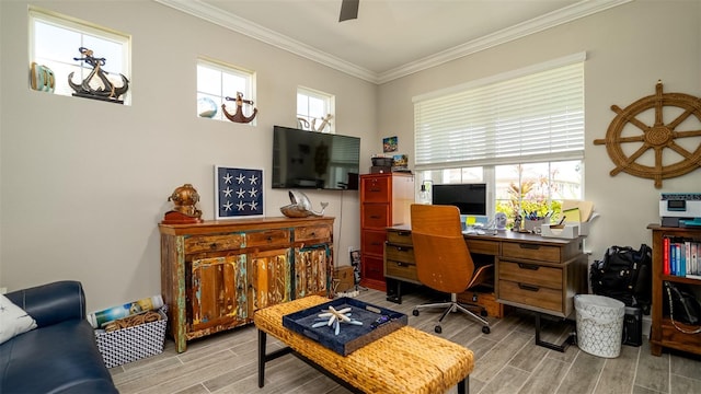 home office featuring wood tiled floor, ornamental molding, and a ceiling fan