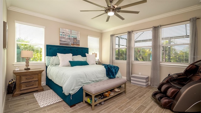 bedroom featuring ornamental molding, a ceiling fan, and wood tiled floor