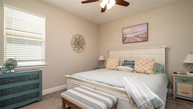 bedroom with carpet, baseboards, and ceiling fan