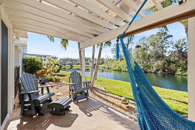 view of patio featuring a water view