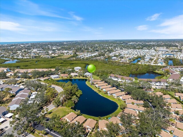 aerial view featuring a water view and a residential view