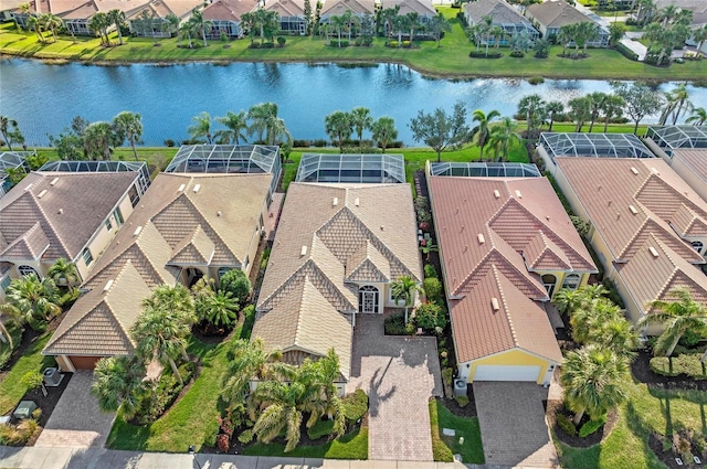 bird's eye view featuring a residential view and a water view