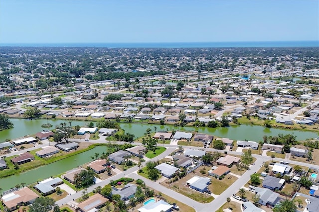 aerial view featuring a water view and a residential view