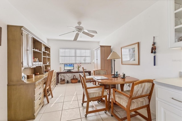 dining room with light tile patterned flooring and ceiling fan
