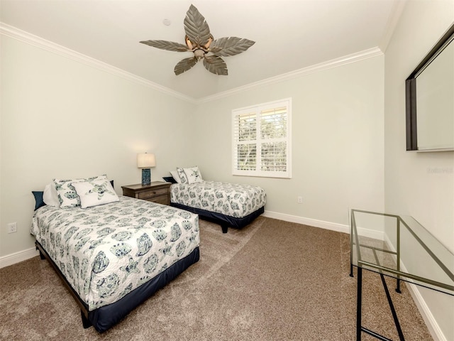 carpeted bedroom featuring ornamental molding, baseboards, and a ceiling fan