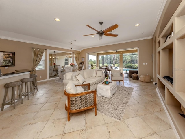 living room with ceiling fan with notable chandelier, ornamental molding, baseboards, and recessed lighting