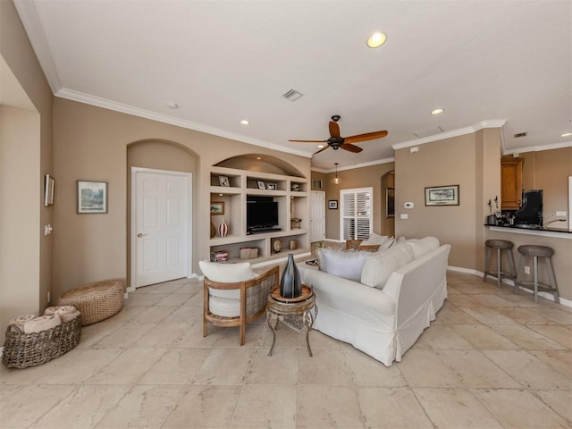 living room featuring visible vents, a ceiling fan, ornamental molding, built in shelves, and recessed lighting