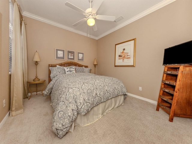 carpeted bedroom featuring ornamental molding, ceiling fan, and baseboards