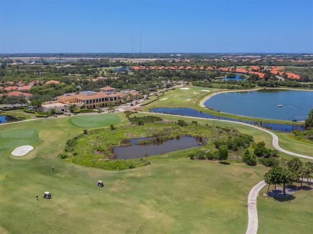 aerial view featuring view of golf course and a water view