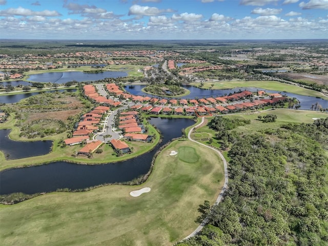 birds eye view of property featuring a water view and golf course view