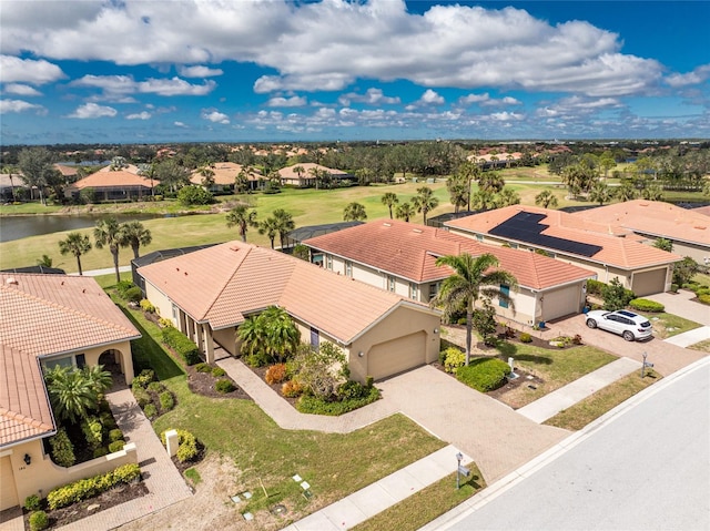 birds eye view of property with a residential view