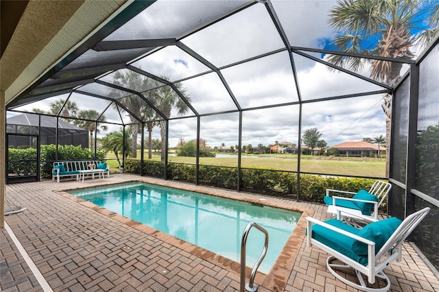 pool featuring a lanai and a patio