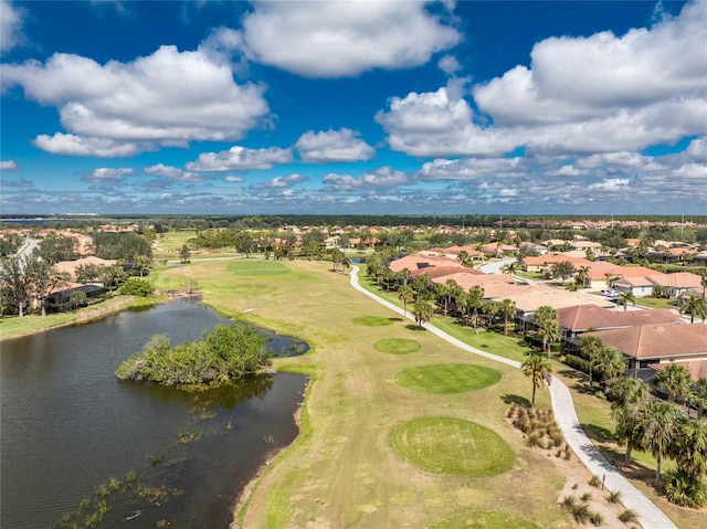 drone / aerial view with a water view and a residential view