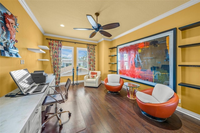 office space featuring built in shelves, wood-type flooring, ornamental molding, a ceiling fan, and baseboards