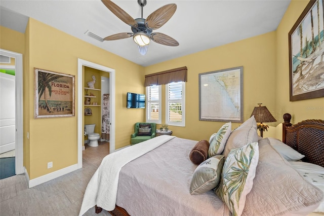 bedroom with ceiling fan, connected bathroom, visible vents, and baseboards