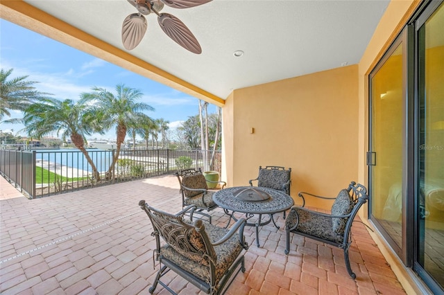 view of patio / terrace featuring fence