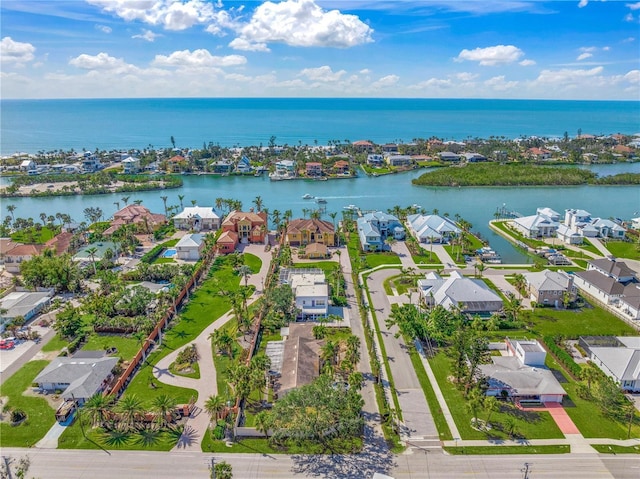 aerial view with a water view and a residential view