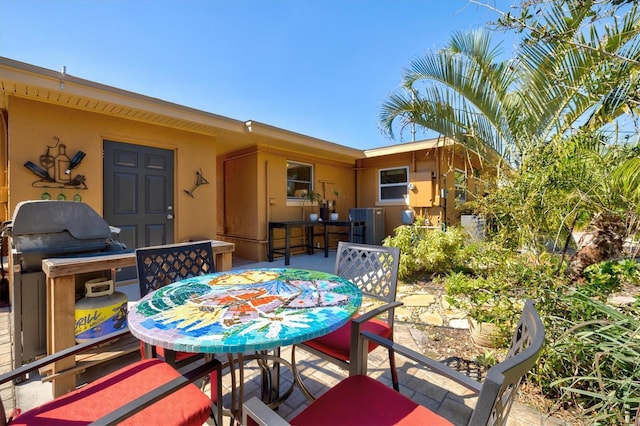 view of patio with outdoor dining space