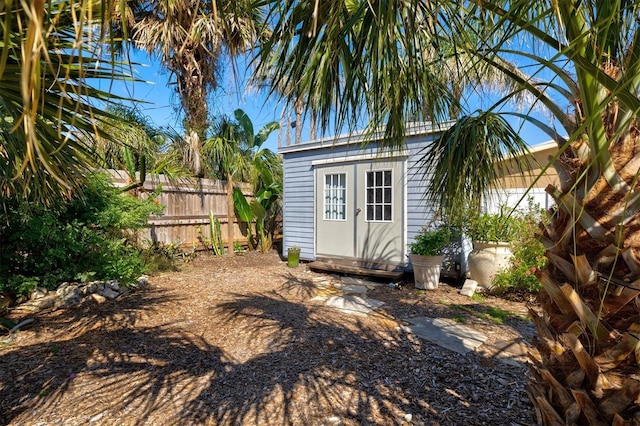 view of outdoor structure featuring an outdoor structure and fence