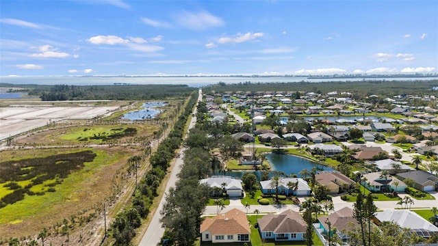 birds eye view of property featuring a residential view and a water view