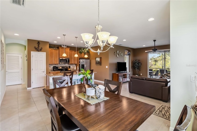 dining space featuring light tile patterned floors, visible vents, and recessed lighting