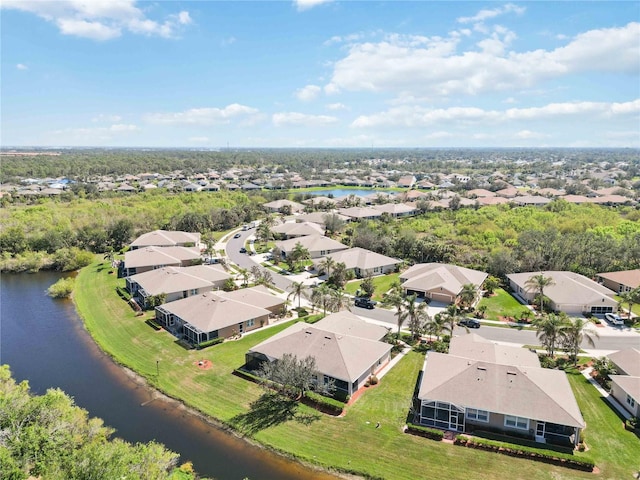 bird's eye view with a water view and a residential view