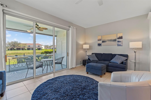 1050 Jonah Dr, North Port, FL 34289 - tiled living area with a ceiling fan and baseboards