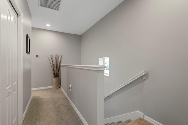 1050 Jonah Dr, North Port, FL 34289 - corridor featuring carpet, recessed lighting, visible vents, an upstairs landing, and baseboards