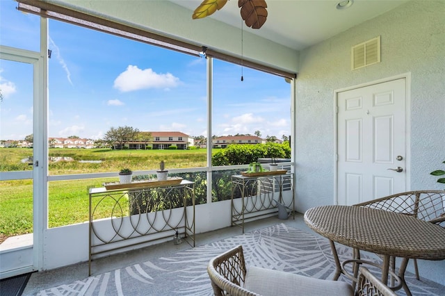 1050 Jonah Dr, North Port, FL 34289 - sunroom / solarium featuring ceiling fan and visible vents