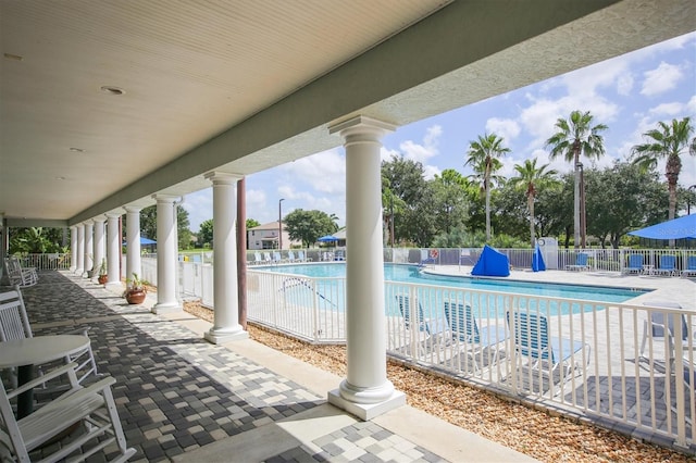 1050 Jonah Dr, North Port, FL 34289 - pool featuring a patio and fence